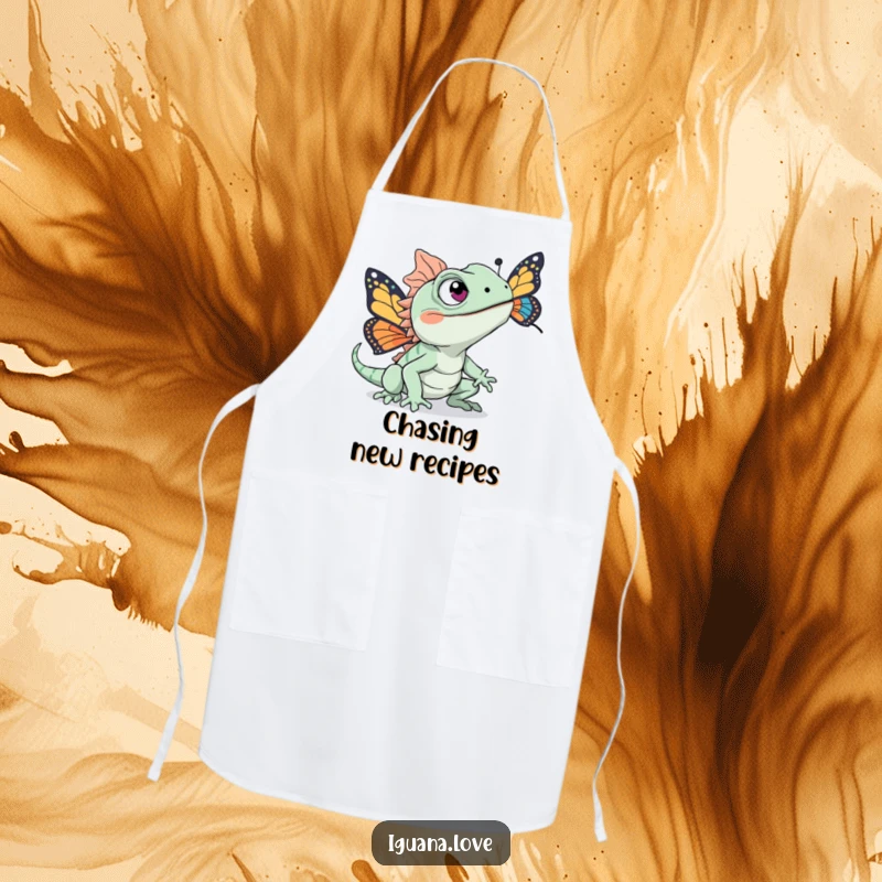 Funny apron featuring an iguana character with excited eyes chasing a colorful butterfly, adding playful energy to the kitchen.