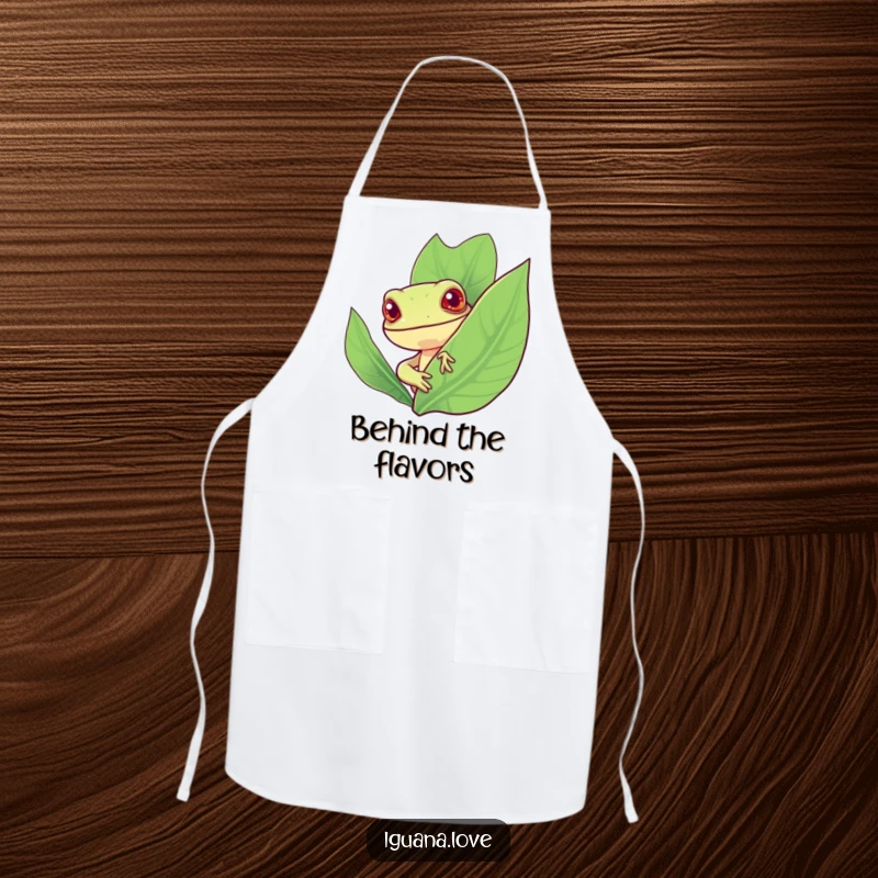 Funny apron showcasing a stylized iguana with a cheerful expression peeking curiously from behind a large, vibrant leaf, ideal for kitchen fun.