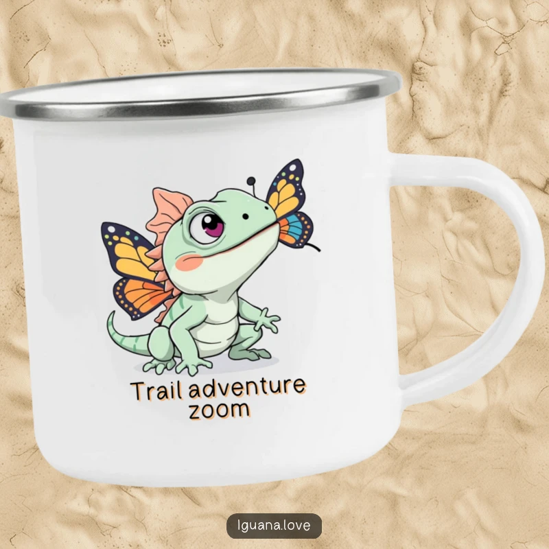Funny enamel camping mug with an excited iguana character chasing a colorful butterfly, perfect for outdoor adventures.