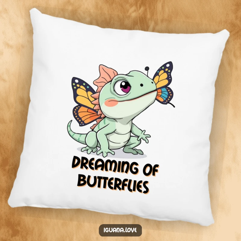 Funny throw pillow depicting an iguana with excited eyes in pursuit of a colorful butterfly, adding lively decor.