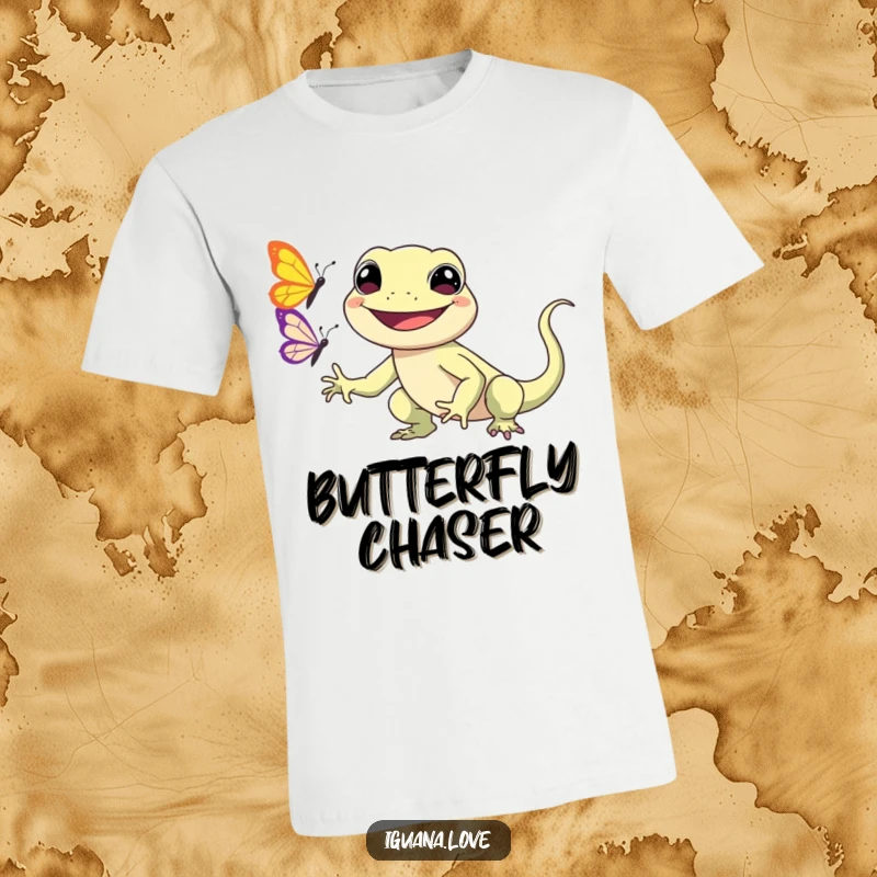 Funny Kawaii Iguana T-Shirt depicts a happy, smiling iguana character in pursuit of a fluttering butterfly, exuding charm and playfulness.