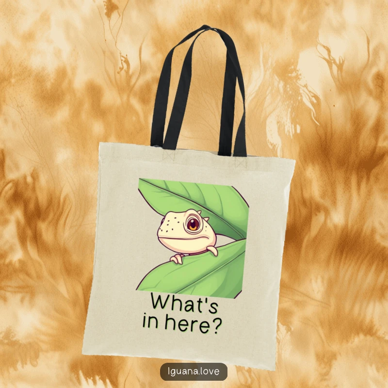 Funny Curious Iguana Tote Bag, peeking from a big leaf, offering a humorous and engaging visual, great for eco-conscious shoppers.